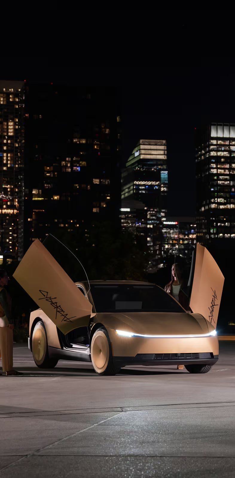 Gold Cybercab at night with butterfly doors open and city skyline